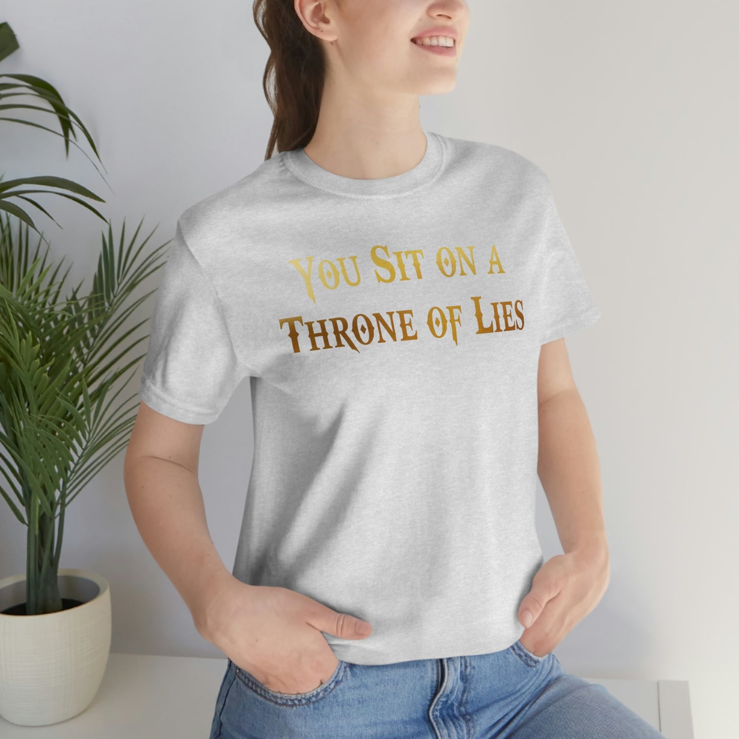 You Sit on A Throne of Lies Gold Font Unisex Jersey Short Sleeve Tee