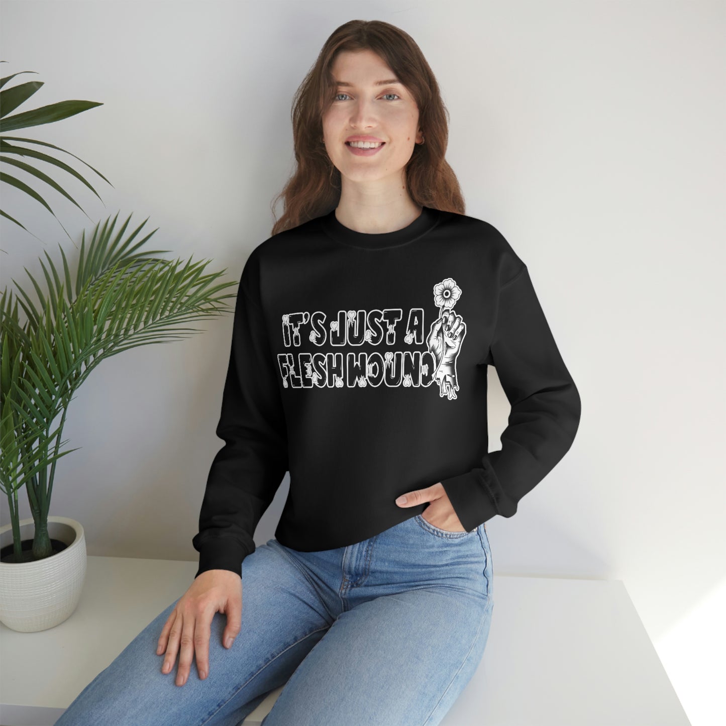 It's Just A Flesh Wound unisex heavy blend crewneck sweatshirt